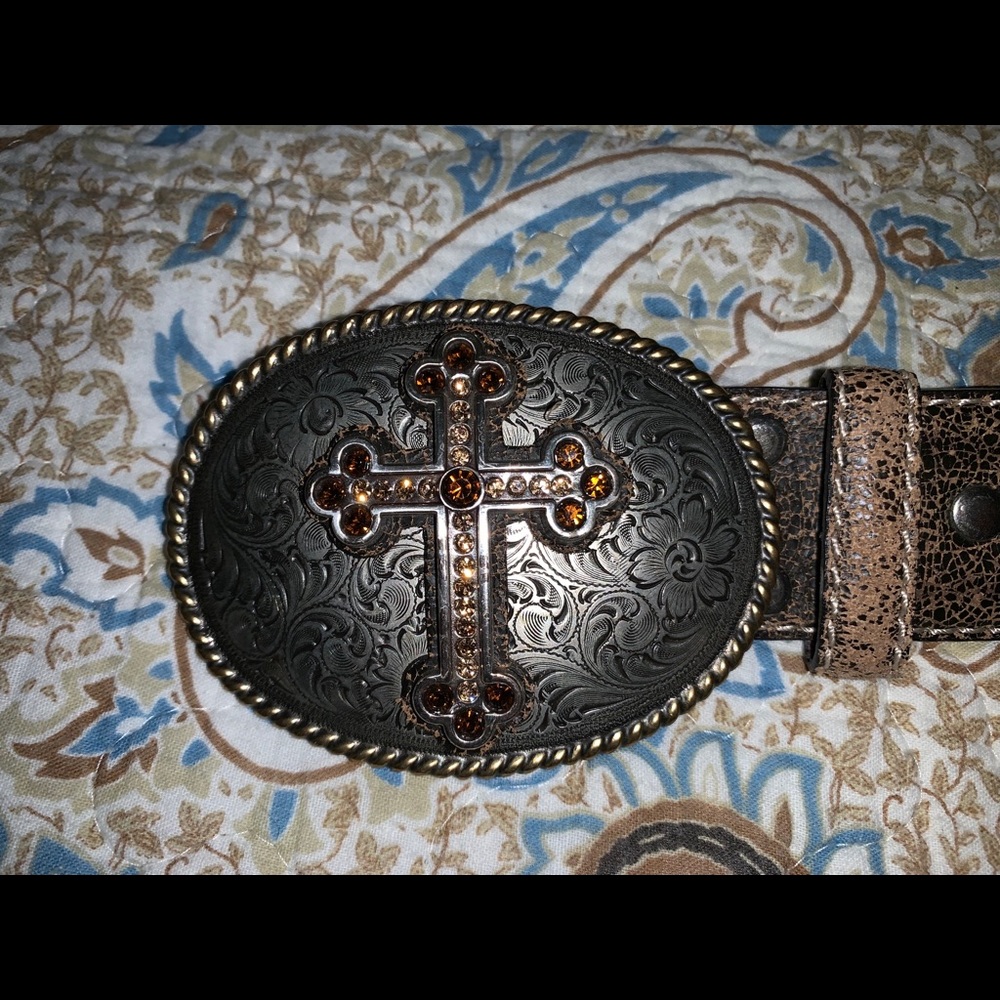 Cross belt buckle and brown belt